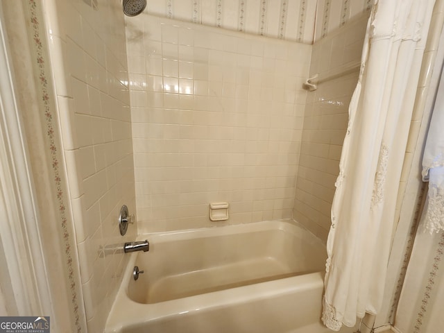 bathroom featuring shower / bath combination with curtain