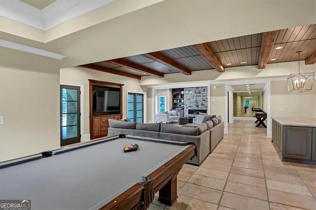 playroom featuring beamed ceiling, a wealth of natural light, pool table, and light tile patterned flooring