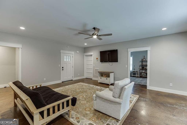 living room with ceiling fan