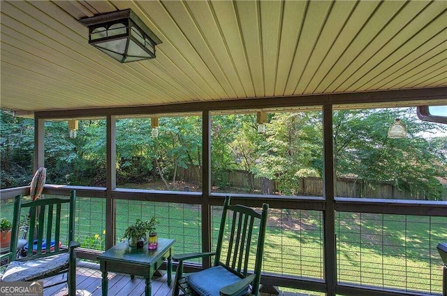 sunroom / solarium with wooden ceiling