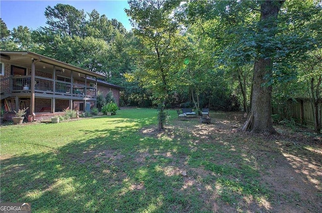 view of yard featuring a deck