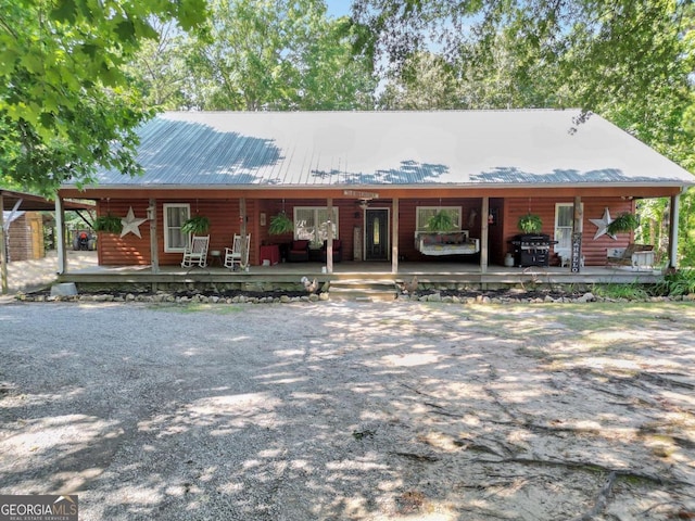 view of front of property featuring covered porch