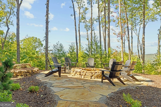 view of patio featuring an outdoor fire pit