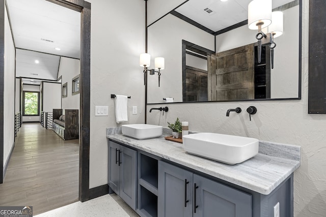 bathroom featuring vanity and hardwood / wood-style floors