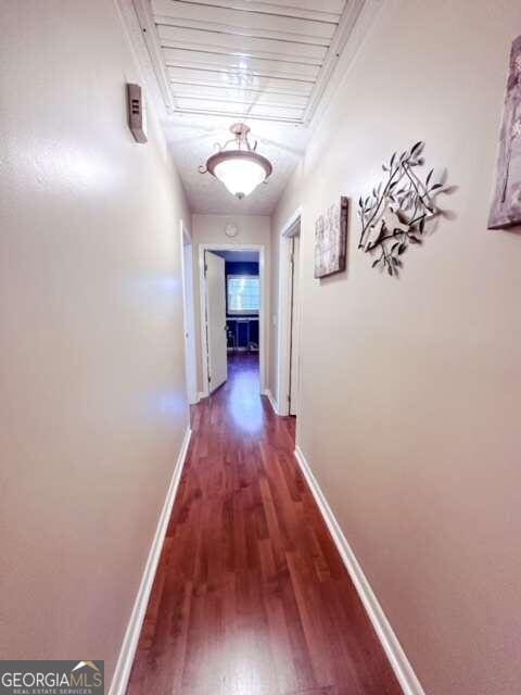 hall featuring dark hardwood / wood-style floors