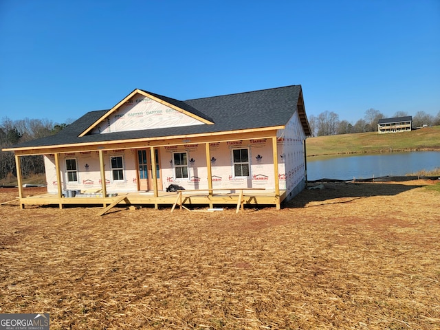 property under construction featuring covered porch