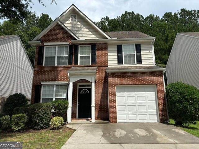 view of front of house with a garage