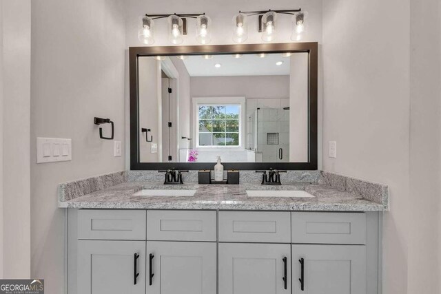 bathroom with dual vanity