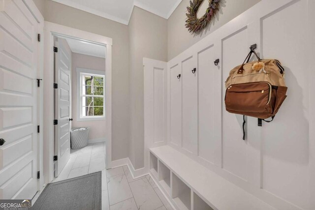 mudroom with light tile patterned flooring