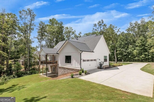 view of property exterior with a lawn