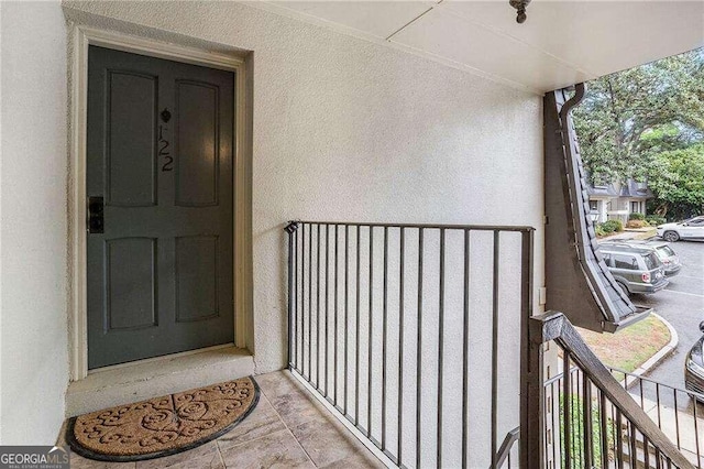 property entrance with a balcony