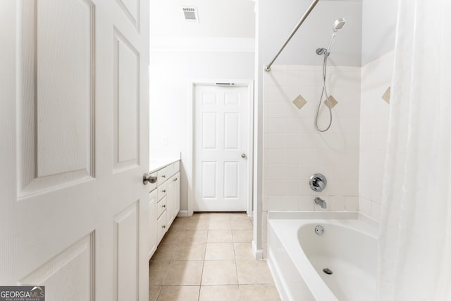 bathroom featuring crown molding, shower / tub combo, tile patterned flooring, and vanity