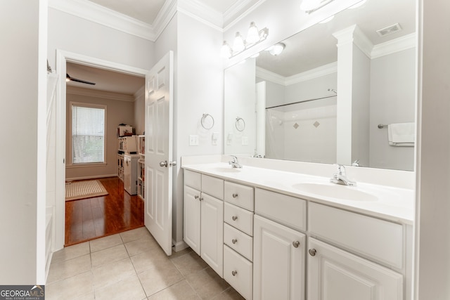 bathroom featuring a shower with shower curtain, vanity, hardwood / wood-style floors, and crown molding