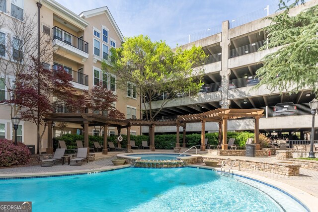 view of pool featuring a patio area