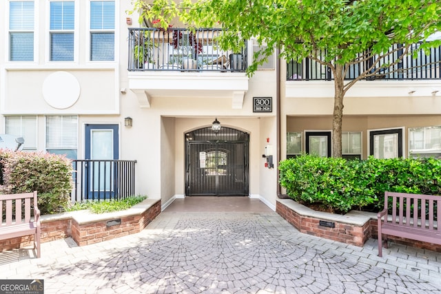 doorway to property featuring a balcony