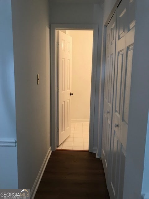 hallway featuring hardwood / wood-style flooring