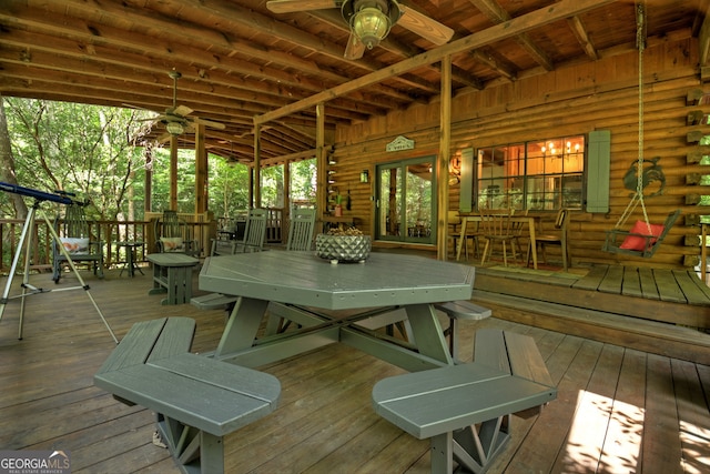 wooden deck with ceiling fan