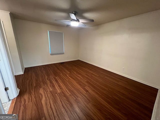 unfurnished room with ceiling fan and wood-type flooring