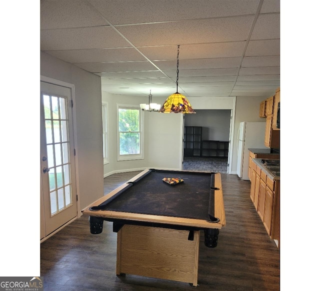 game room with plenty of natural light, pool table, dark hardwood / wood-style floors, and a drop ceiling