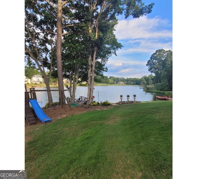 view of yard with a water view