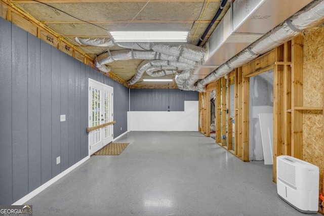 basement with wooden walls