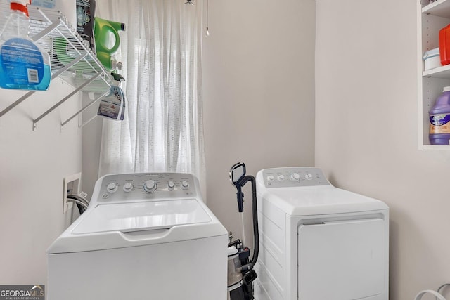 laundry room featuring washer and dryer