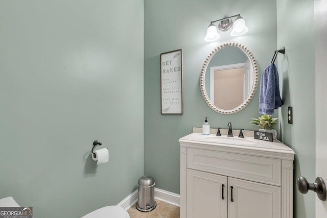 bathroom featuring tile patterned floors and vanity