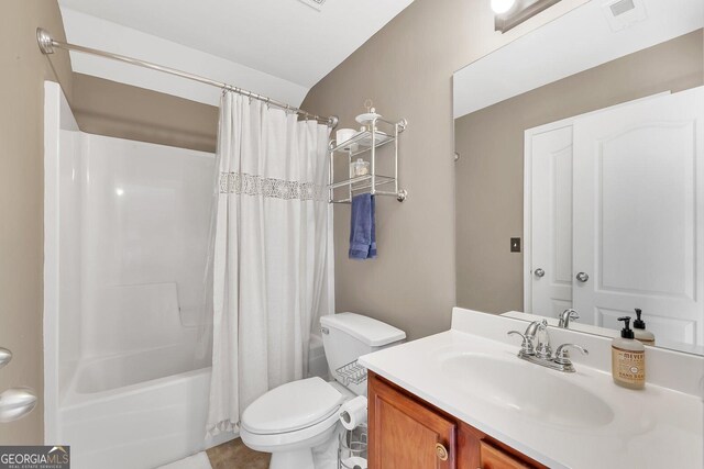 full bathroom featuring vanity, toilet, and shower / bath combo