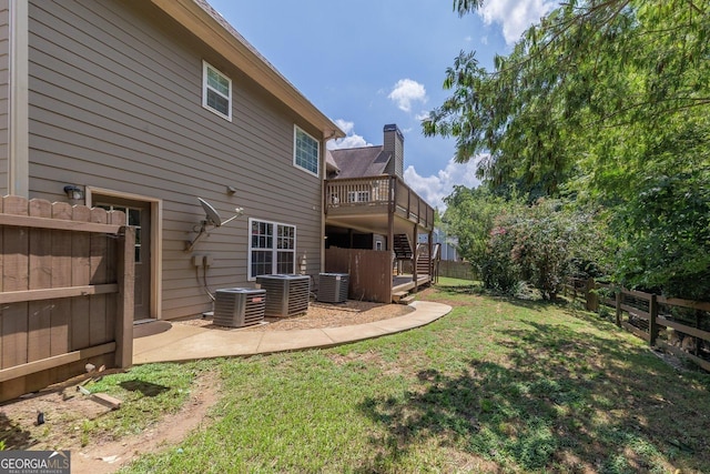 view of yard featuring central AC