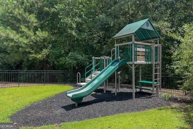 view of playground featuring a yard