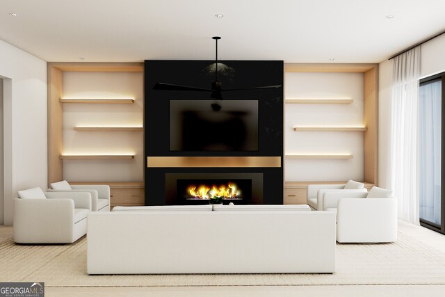 living room with plenty of natural light and a fireplace