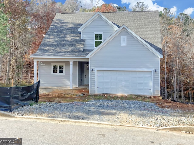 view of front of property featuring a garage