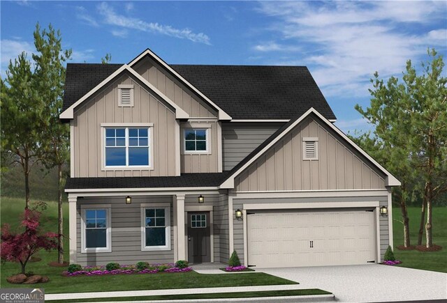 view of front facade featuring a garage and a front yard