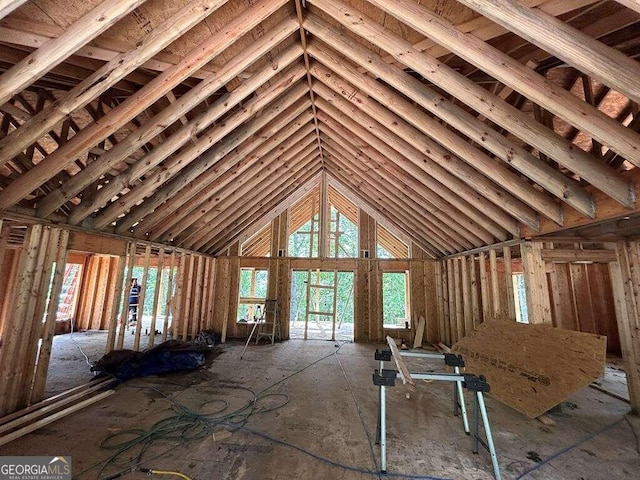 interior space featuring a towering ceiling