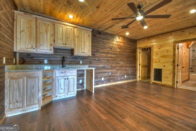 kitchen featuring light brown cabinetry, light stone counters, ceiling fan, dark hardwood / wood-style floors, and wood ceiling