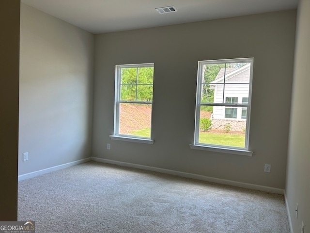 view of carpeted spare room