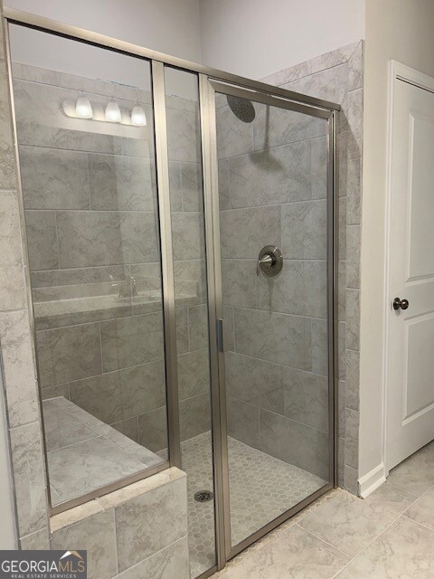 bathroom with walk in shower