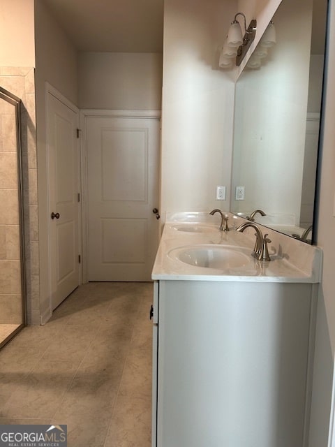 bathroom featuring vanity and walk in shower