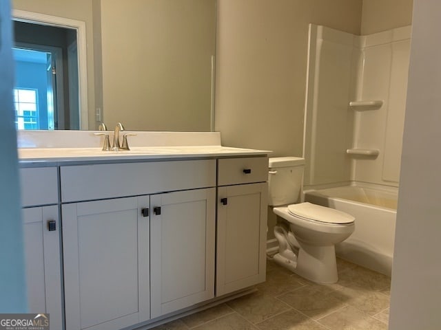 full bathroom with vanity, toilet, and shower / bathtub combination