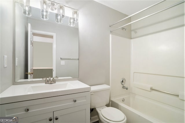 full bathroom with vanity, toilet, and washtub / shower combination