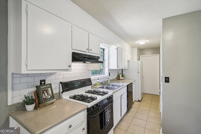 kitchen with decorative backsplash, gas range gas stove, and white cabinetry