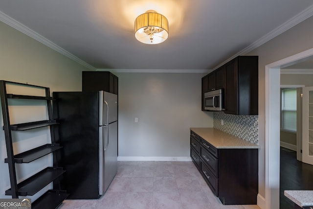 kitchen with stainless steel appliances, decorative backsplash, crown molding, and dark brown cabinets