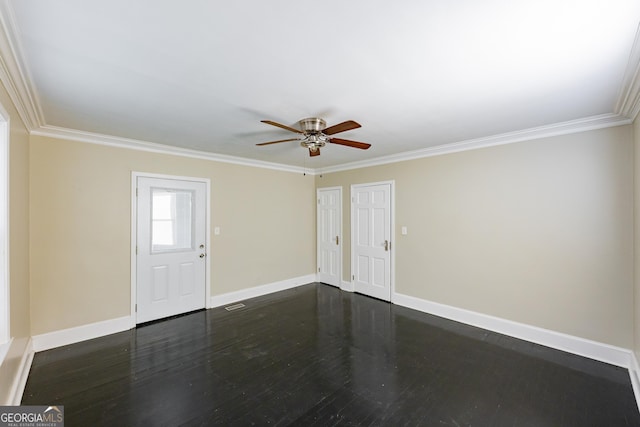interior space featuring ceiling fan, baseboards, and ornamental molding