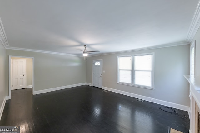 unfurnished living room with ceiling fan, ornamental molding, and dark hardwood / wood-style flooring