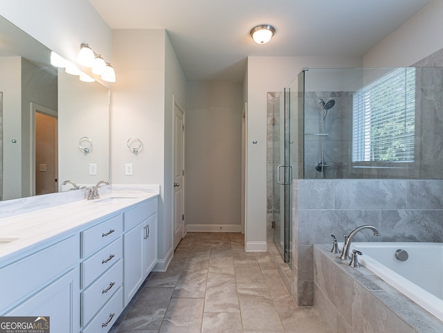 bathroom featuring dual vanity, tile patterned floors, and shower with separate bathtub