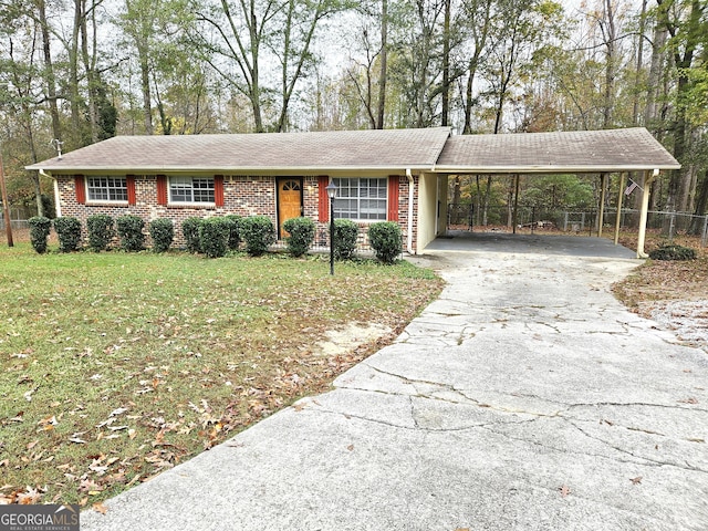 ranch-style house with a front lawn and a carport