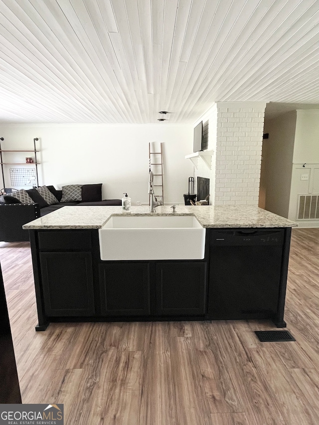 interior space with light hardwood / wood-style flooring and sink