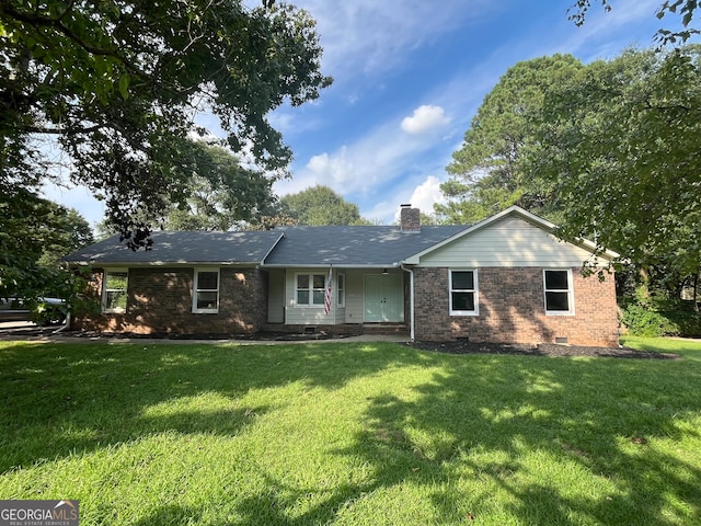 single story home featuring a front yard