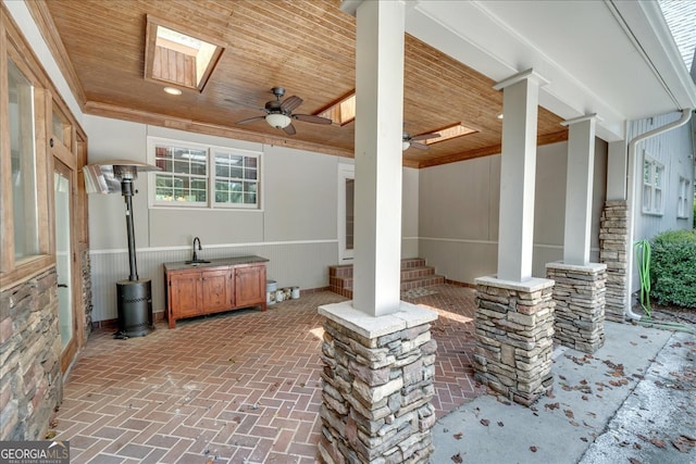 view of patio with ceiling fan