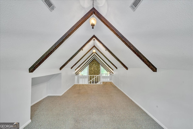 bonus room featuring a textured ceiling, carpet, and vaulted ceiling